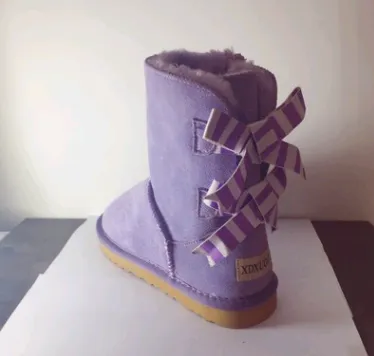 Double bow 2021 tube snow boots women's shoes scrub leather thickening non-slip warm warm foam foam tendon