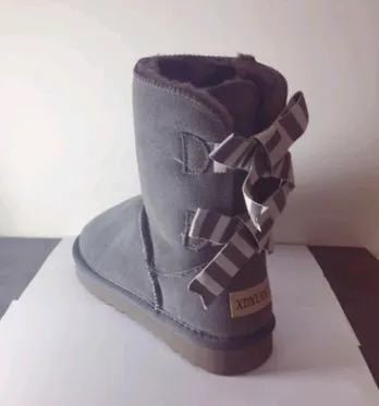 Double bow 2021 tube snow boots women's shoes scrub leather thickening non-slip warm warm foam foam tendon