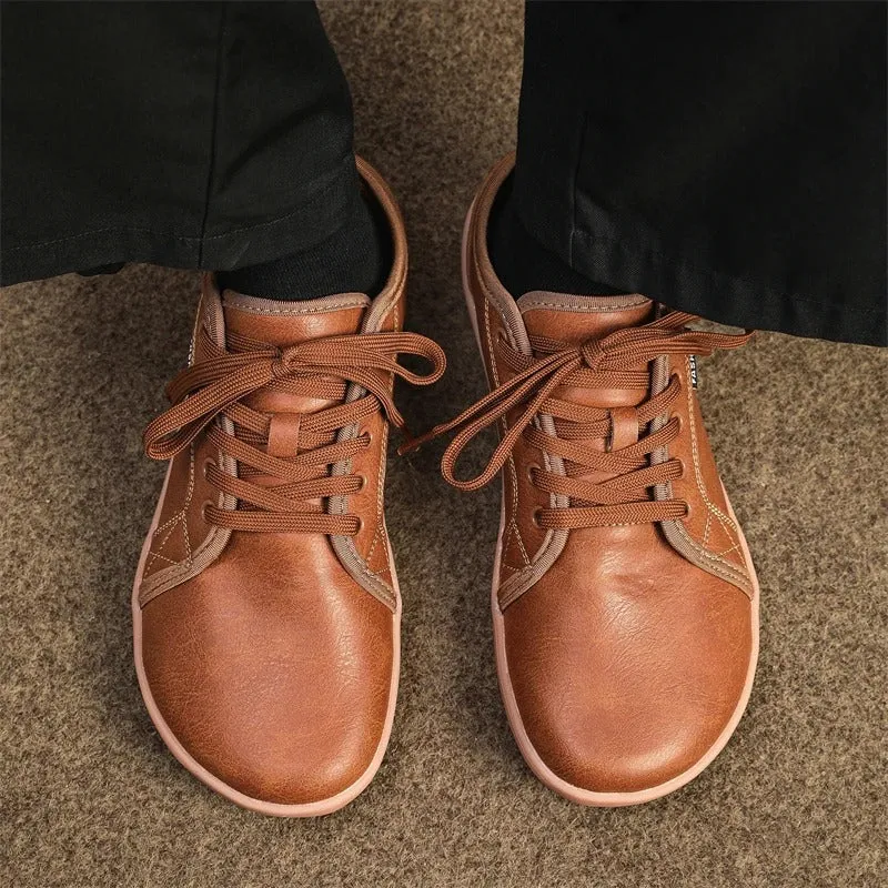 Wide footwear for heel pain